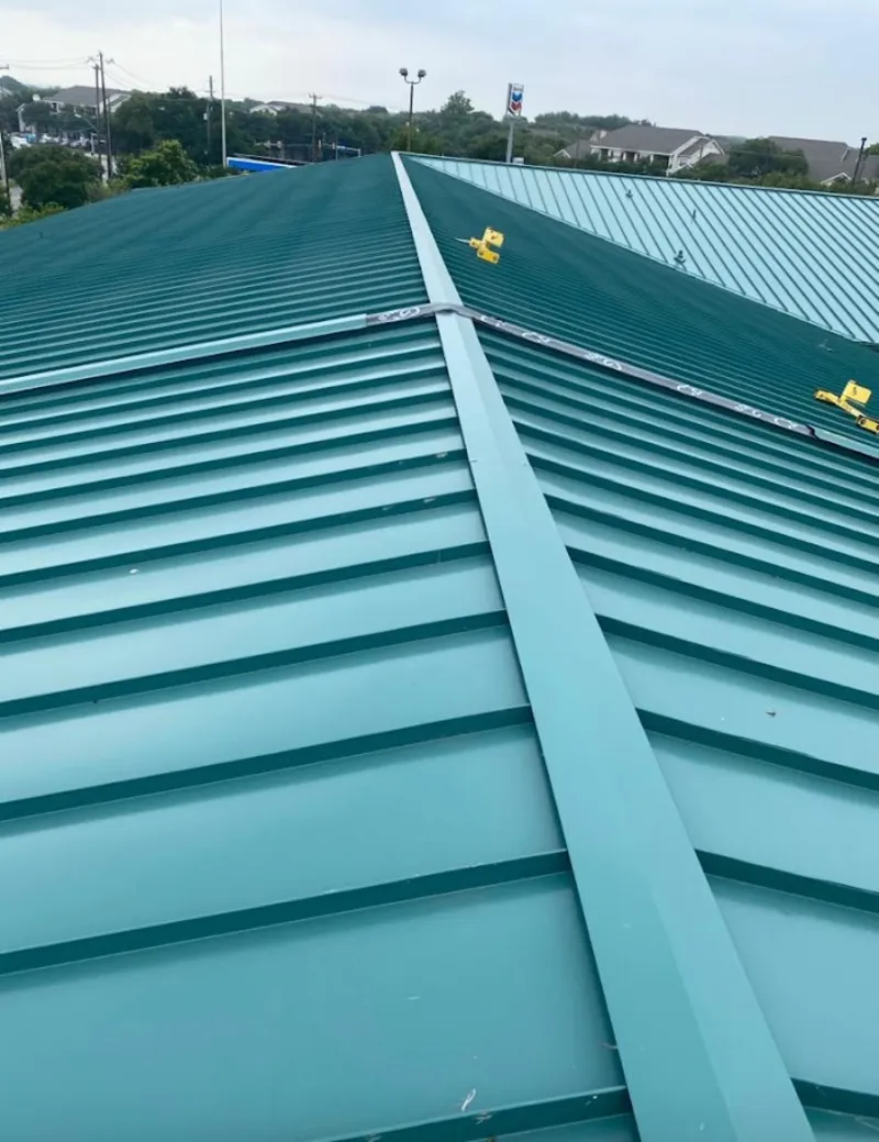 Green commercial metal roof ridge and valley for Metal Roof Repair in Glen Allen